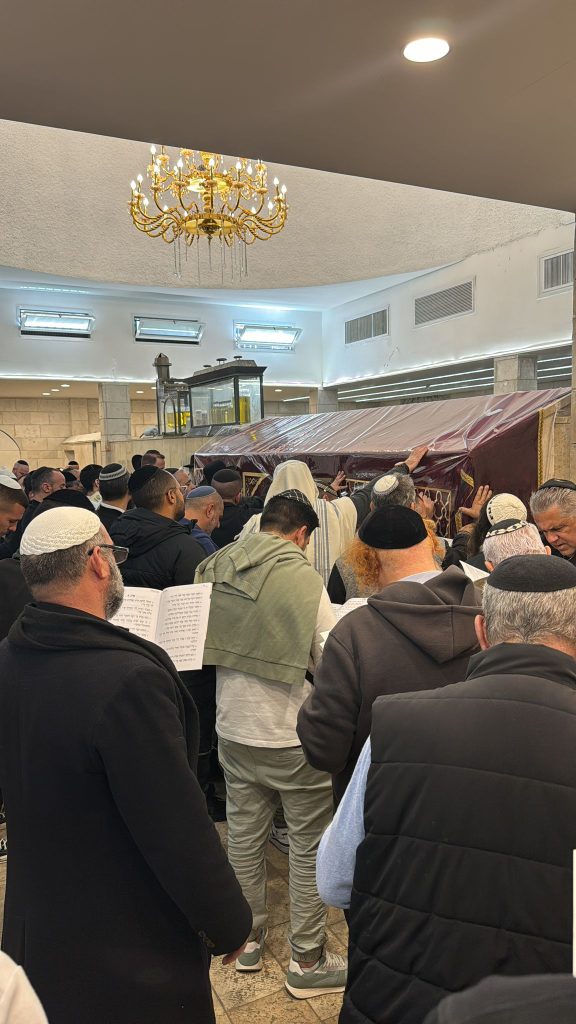 Shalev Haziza visits the grave of the Holy Baba Sali